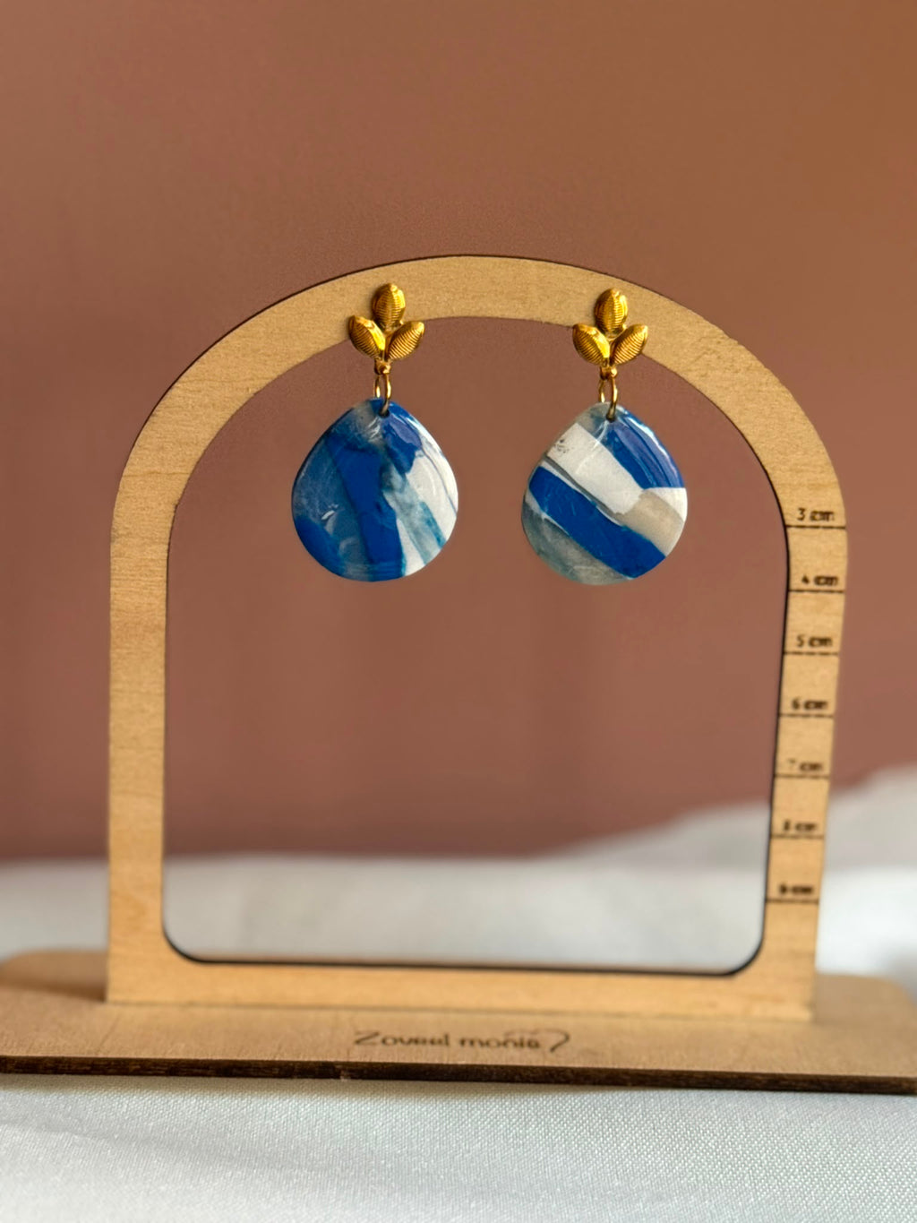 Oorbel blauw met goud