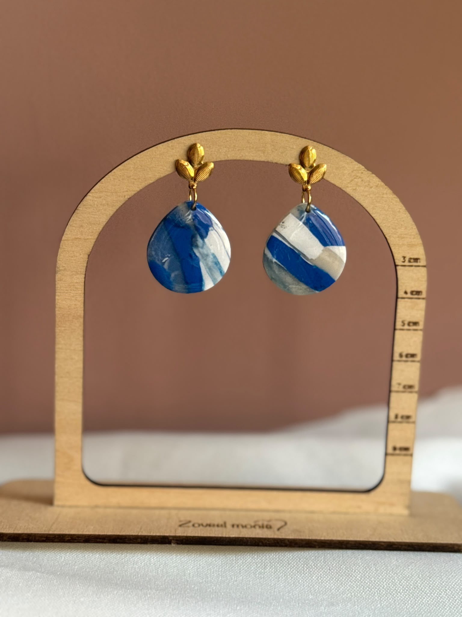 Oorbel blauw met goud